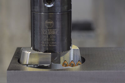 How to enlarge existing holes when machining metals